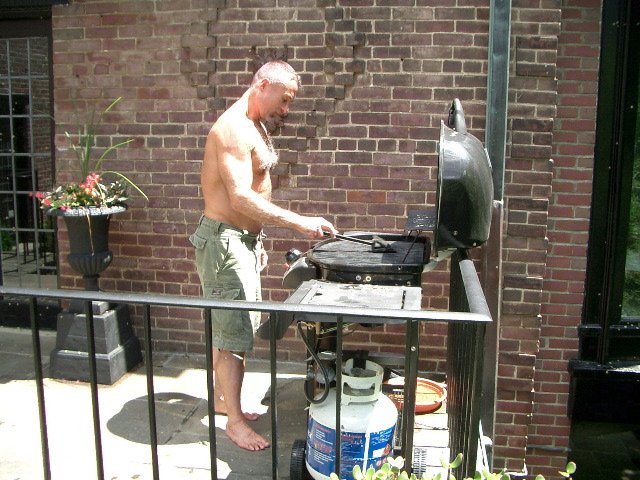 Jay cooking on the grill